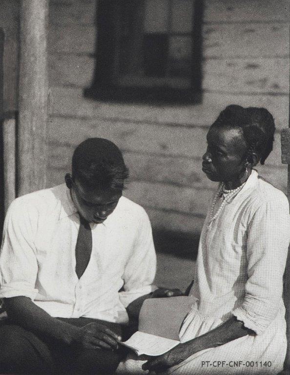 Man and Woman with Book, 1920’s;  PT/CPF/CNF/001140